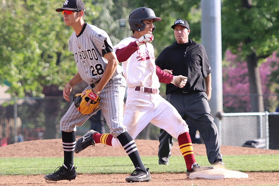Shane Ogata has become a big part of PCC's hot batting as the Lancers are two games up in first place in the South Coast Conference North Division. He reaches third base here during the team's win on Thursday, photo by Richard Quinton.