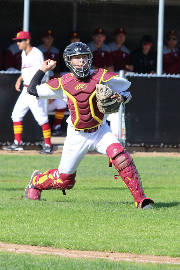 Jessie Garcia has been a stalwart as a freshman catcher for the Lancers this season, photo by Richard Quinton.