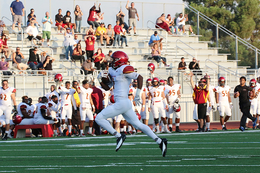 Stevie Williams is off to the races for a 70-yard TD pass from Ian Brian early in the first quarter of PCC's loss at San Bernardino Valley College, photo by Richard Quinton.