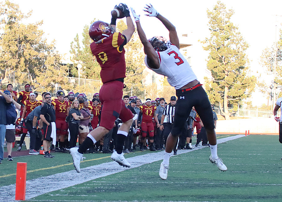 Forest Fajardo hauls in PCC's lone touchdown in the first quarter of Saturday's loss v. Chaffey, photo by Richard Quinton.