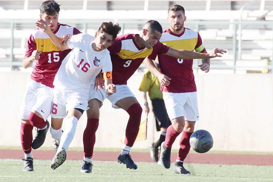 Lancer David Vasquez-Mena (9) fights for the ball in a recent game.