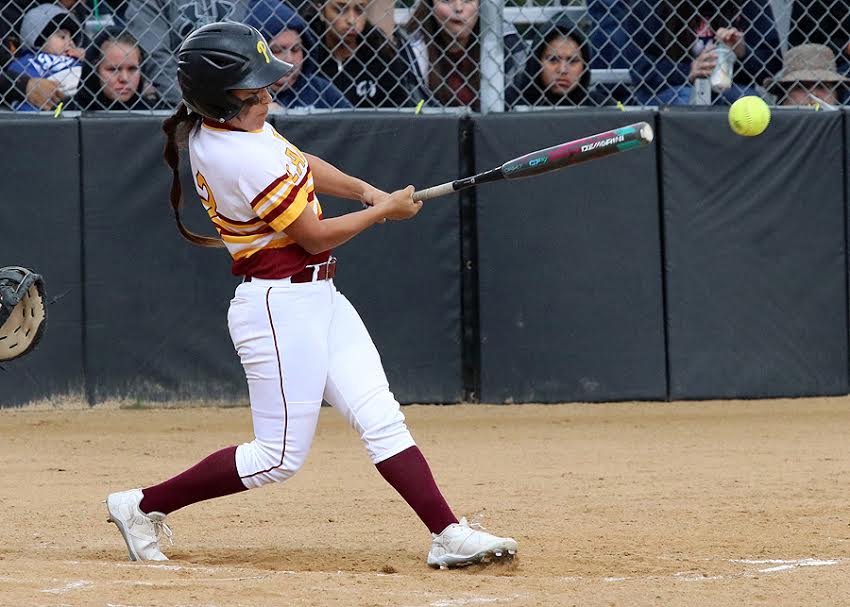 Catcher Jeneve Medrano, batting here, has been a steady performer behind the plate to help PCC to a 13-7 record thus far, photo by Richard Quinton.