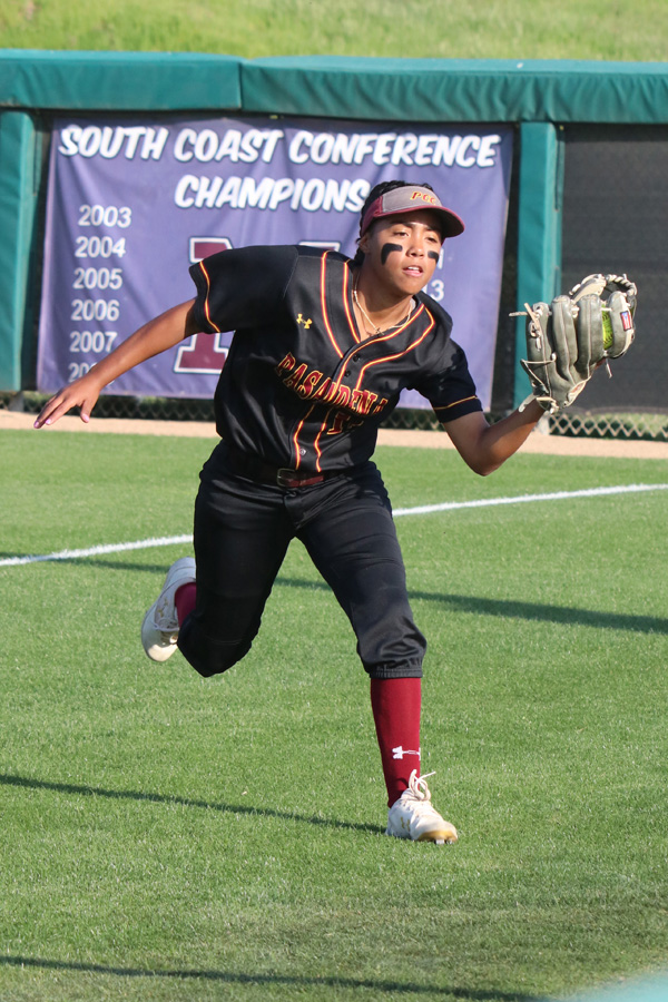 PCC rightfielder Leilani Montanez makes a running catch in the team's game at Mt. San Antonio College on April 3, photo by Richard Quinton.