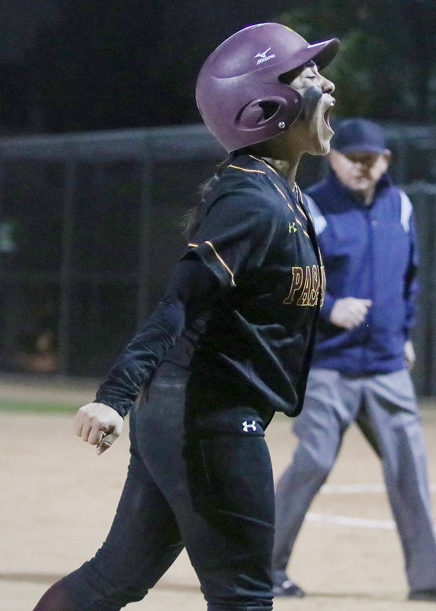 Jeneve Medrano after delivering her 2-RBI single to help PCC beat ELAC, 7-4 on Tuesday night, photo by Richard Quinton.