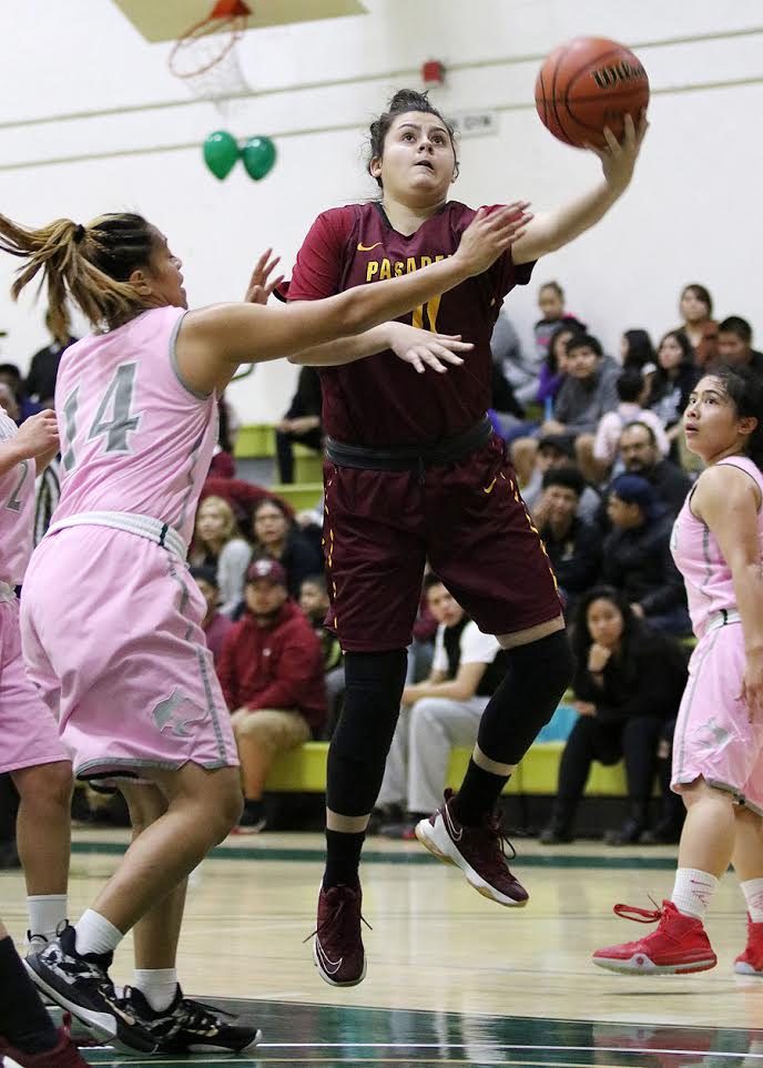 Ilianna Blanc goes up for a basket during Friday night's conference finale loss at East Los Angeles College, photo by Richard Quinton.