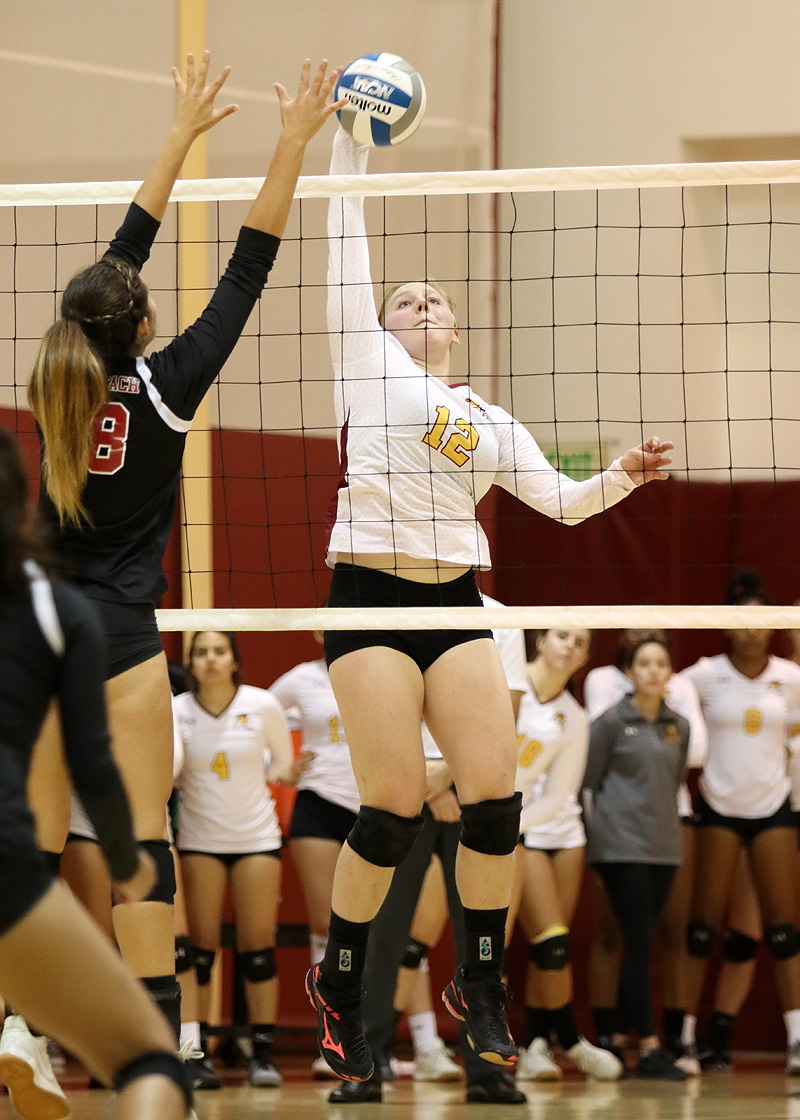 Paige Clingaman goes up for the hitting attack during PCC's loss to Long Beach on Friday, photo by Richard Quinton.
