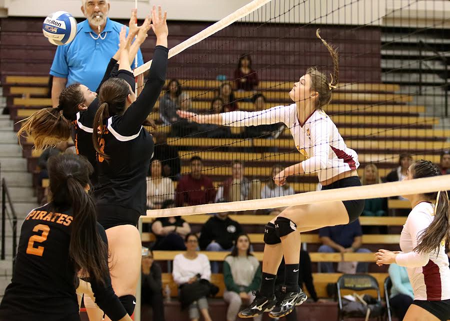 Rachel Johnson rips one of her eight kills as PCC swept Ventura to open the SoCal Regional Playoffs Saturday night at Hutto-Patterson Gymnasium, photo by Richard Quinton.