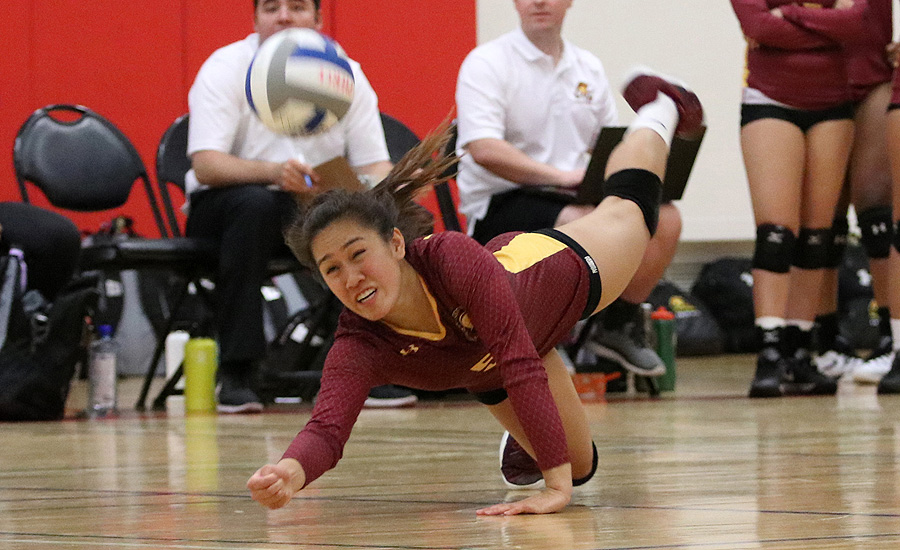 PCC setter Emily Leung makes the diving play to save a ball during the Lancers win over Rio Hondo Saturday at Pierce College, photo by Richard Quinton.