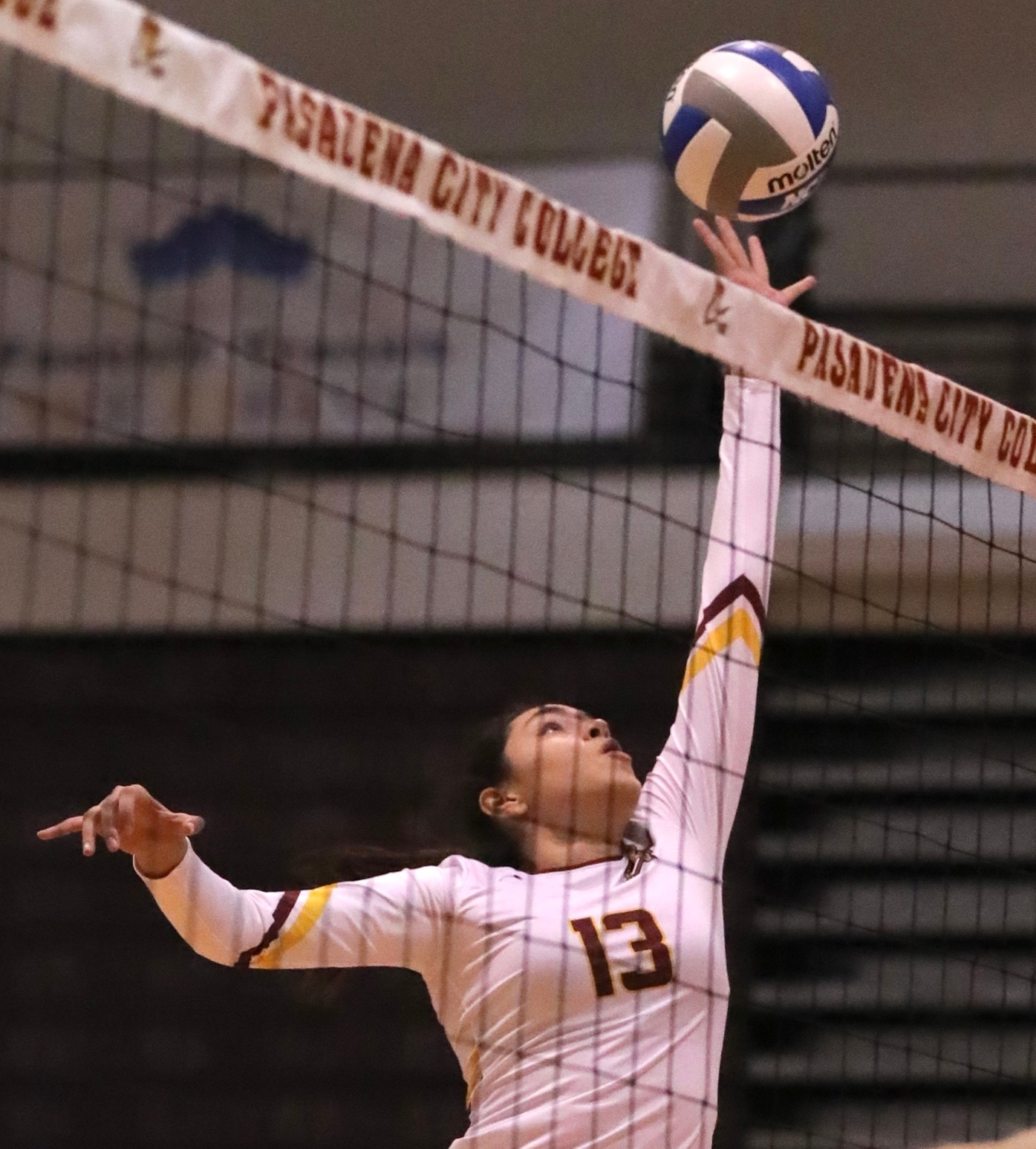 Middle blocker Izabella Hernandez bats down an overpass kill during the Lancers win on Wednesday, photo by Michael Watkins.