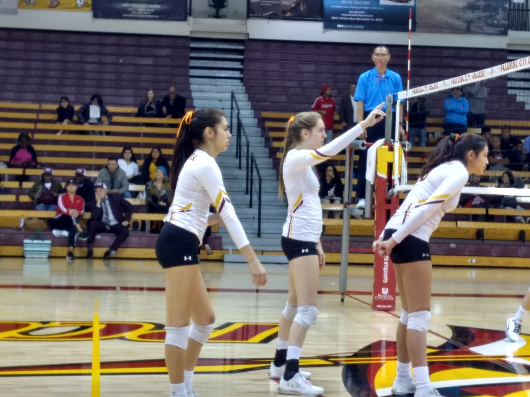 The Lancers front row gets into position right before match point on Wednesday night.