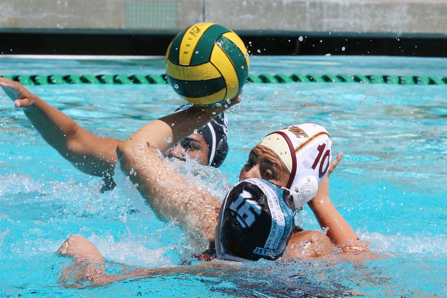Yesenia Marin was 8-for-her-first-8 shots for goals in the PCC women's water polo team's first two games this season. She goes up for a shot here at the LA Valley Tournament on Saturday, photo by Richard Quinton.