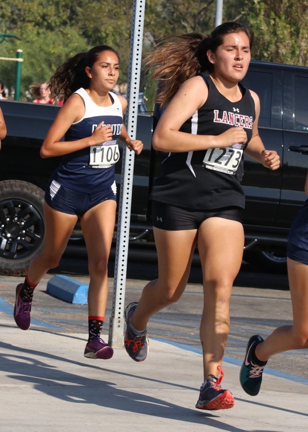 Amanda Noriega (right) was the only Lancer to take part in the South Coast Conference Championships on Friday in Cerritos, photo by Richard Quinton.