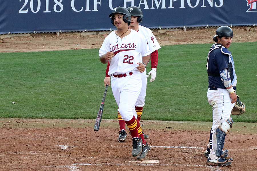 Marco Martinez crosses the plate following a home run earlier this season. The Lancers have been crossing the plate constantly in 2019.