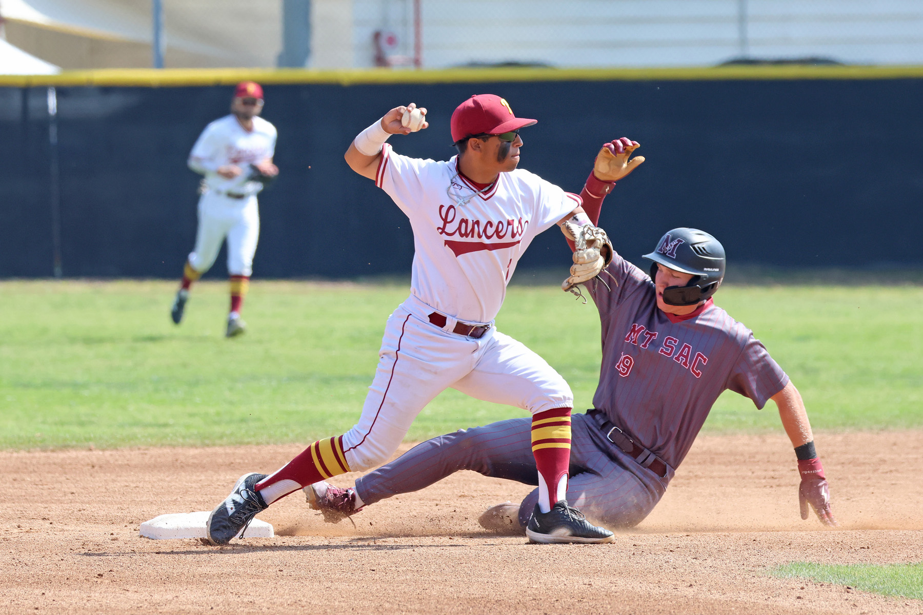 Ivan Barragan turns a double play in Thursday's win (photo by Richard Quinton).