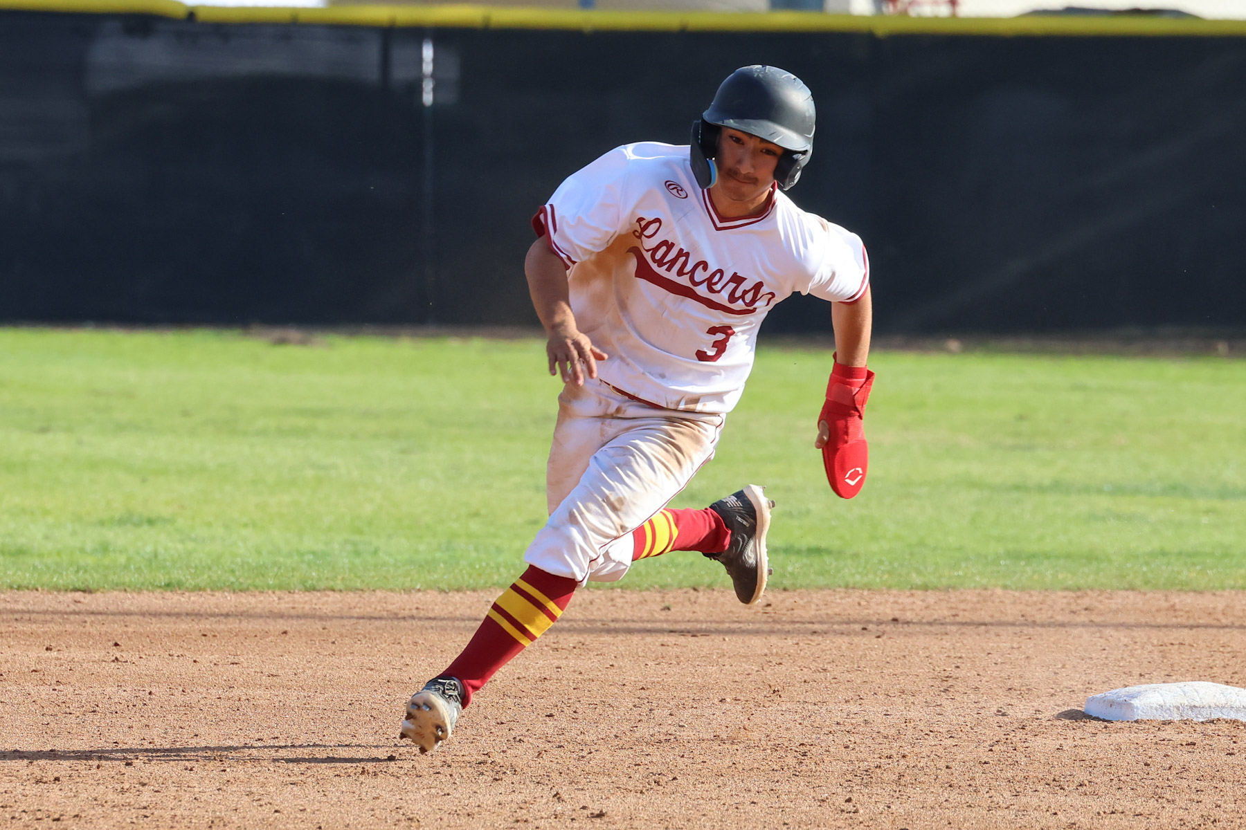 Bryan Richman runs the bases during a recent game (photo by Richard Quinton).