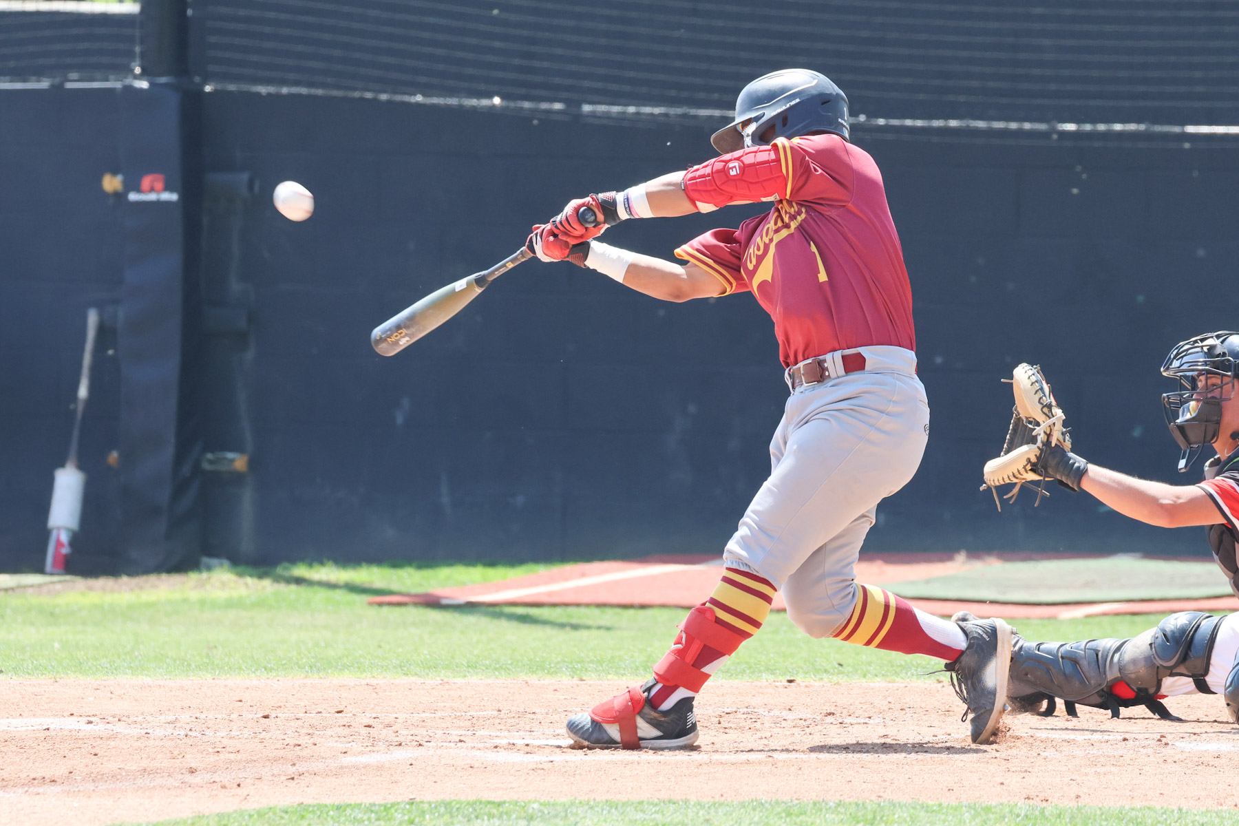 Ivan Barragan lines a hit during the team's 24-run explosion at Chaffey (photo by Richard Quinton).