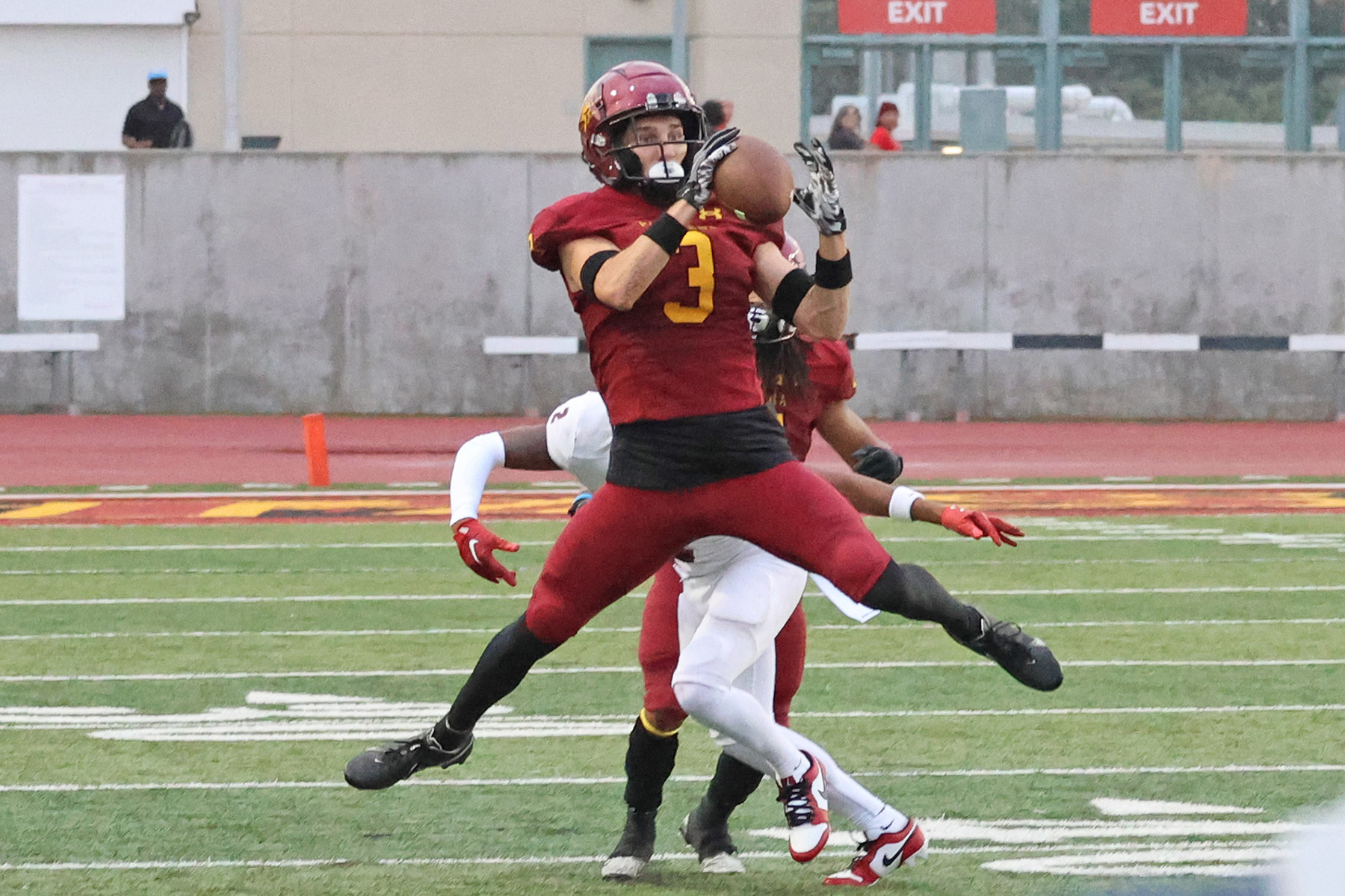 Eli Moulton makes one of his two interceptions here in PCC's season-opening win v. Santa Ana on Friday (photo by Richard Quinton).