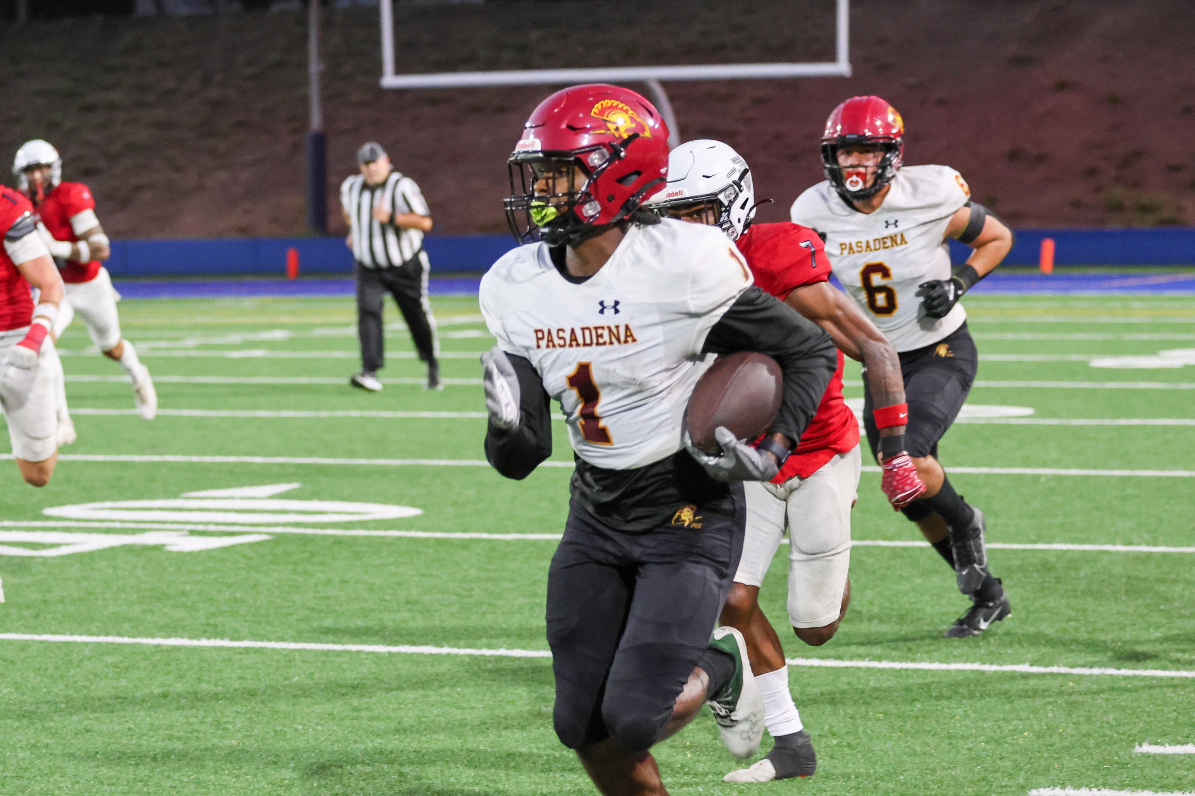 Flip Fox is off to the races for one of his three TDs in PCC football's season-opening win at Santa Ana (photo by Richard Quinton).