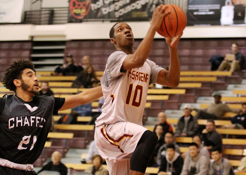 Lancer Eris Winder drives to the basket on Wednesday in PCC's loss to Chaffey, photo by Richard Quinton.