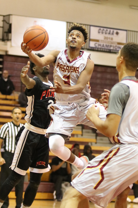 Point guard Khristion Courseault in action during a recent Lancers game, photo by Richard Quinton.