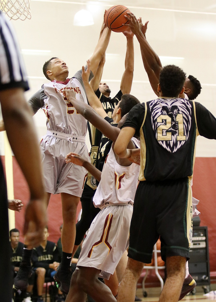 Chris Blount goes up for a rebound in PCC's win over LA Valley Friday night, photo by Richard Quinton.