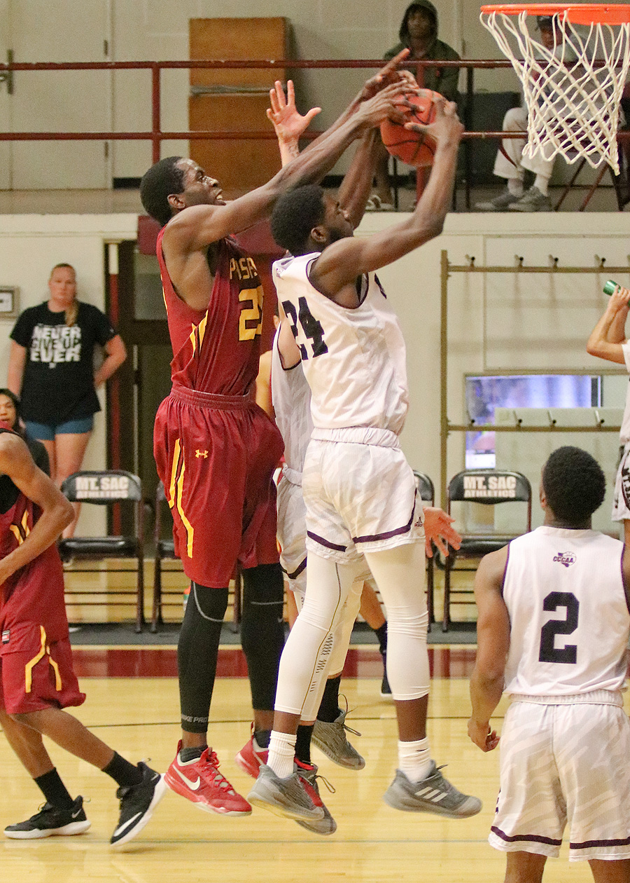 Jordan Simpson reaches for the loose ball offensive rebound at Mt SAC. He had 4 blocks on the defensive side and is one of the state's top shot blockers.