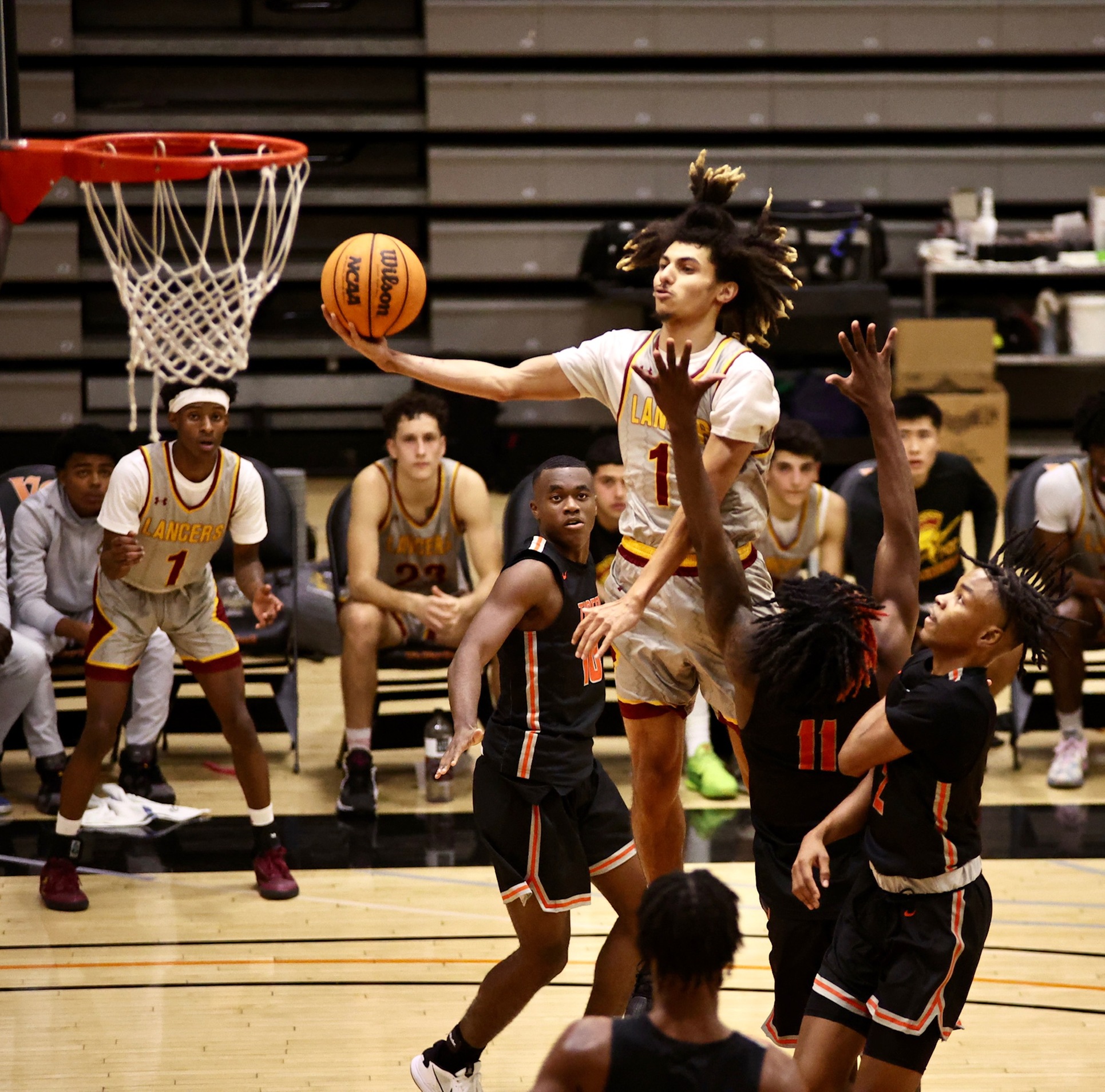 Jayden Winfrey goes up for the shot during the team's season opener v. Riverside at Ventura College on Thursday (photo by Michael Watkins).