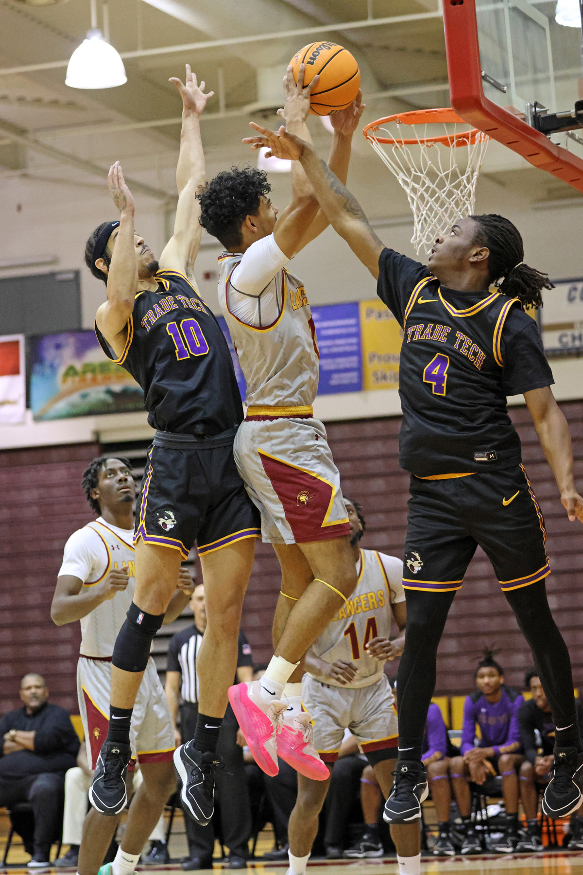 Jalen Vazquez goes up high to the basket on Friday night (photo by Richard Quinton)