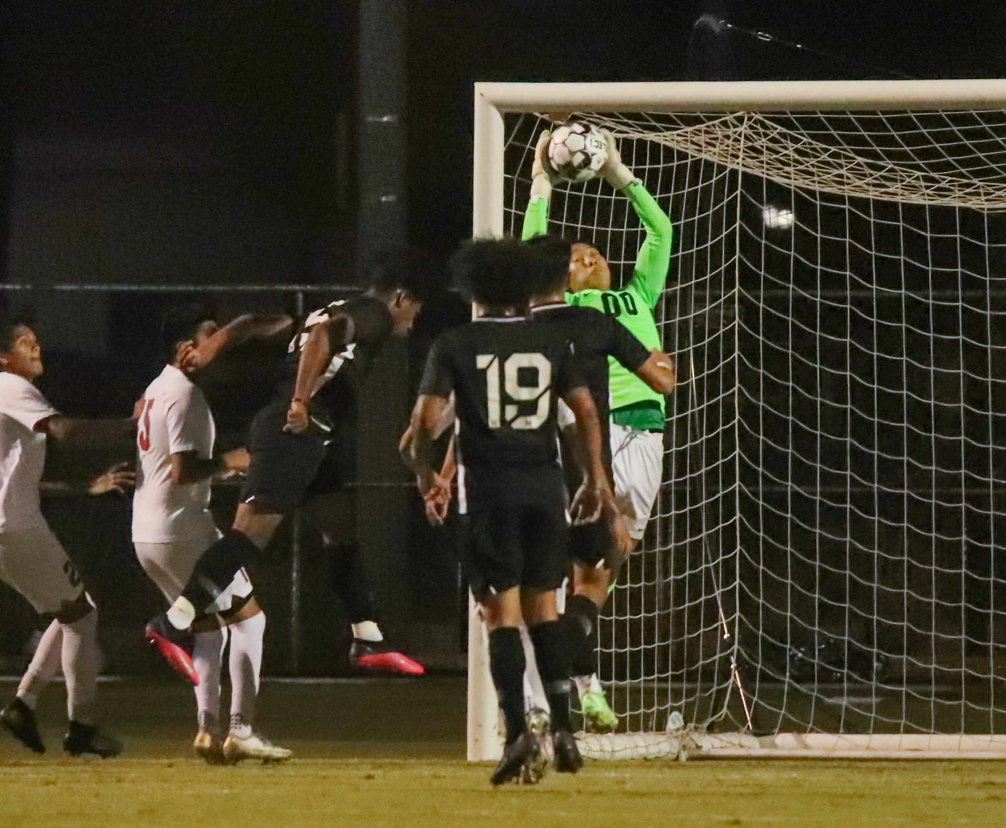 Paul Jing with the leaping grab during PCC's 0-0 tie Friday night at Mt. San Antonio College (photo by Michael Watkins).