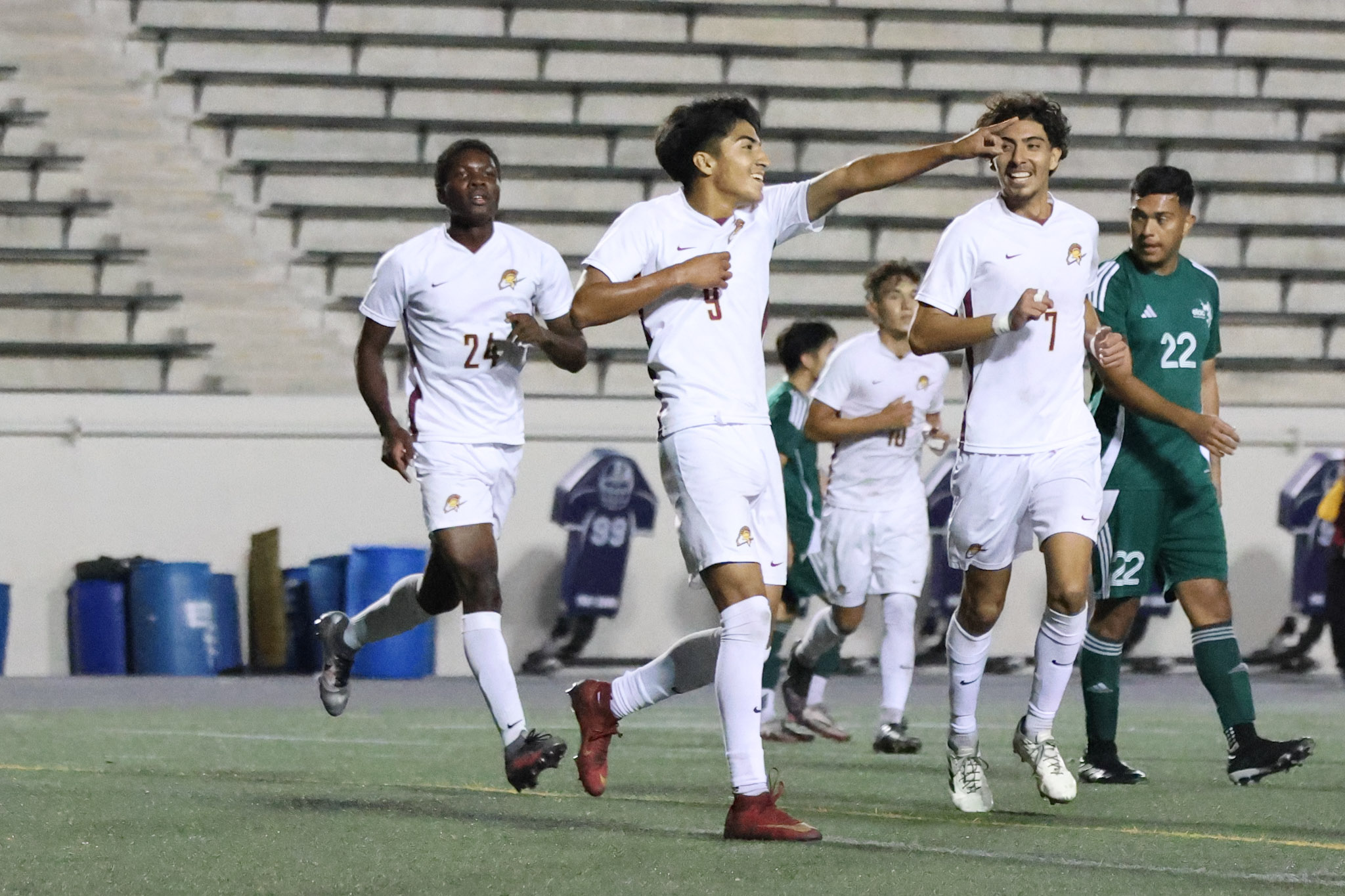 Ariel Hernandez celebrates after scoring the game-winner late at East LA College on Friday night (photo by Richard Quinton).