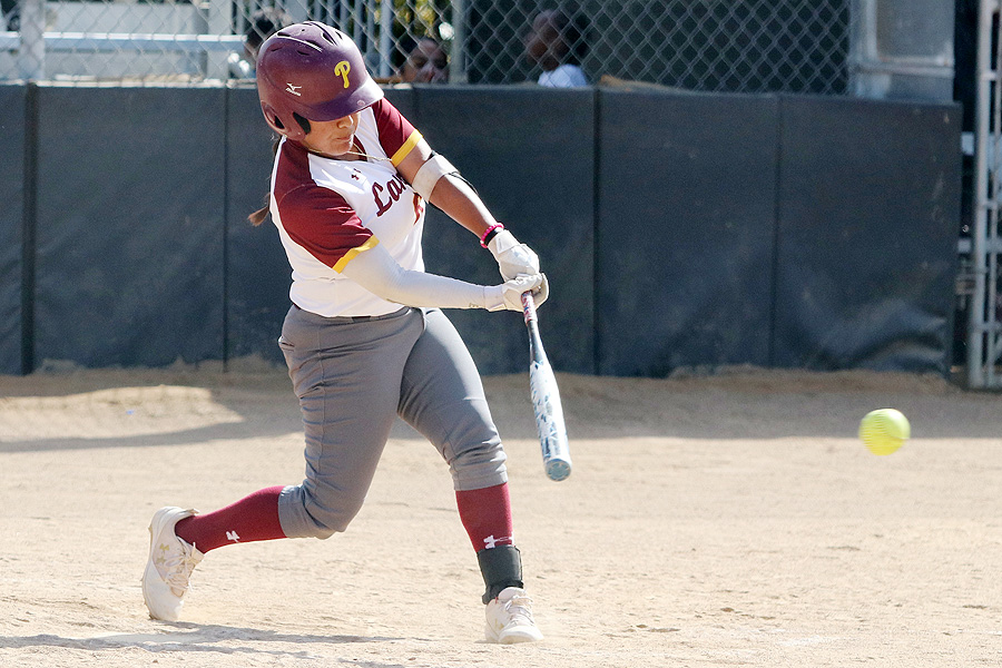 Sophomore shortstop Kaylee Medrano has been on a hitting tear for Lancers. She rips this shot during PCC's win on Friday, photo by Richard Quinton.