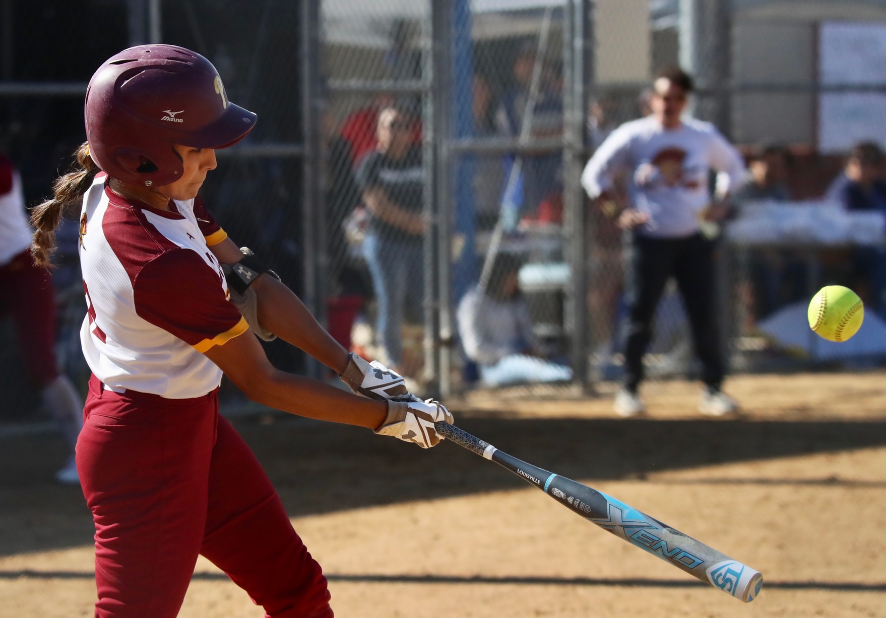 Samantha Diaz connects for a home run in PCC's game on Saturday at Robinson Park, photo by Michael Watkins.
