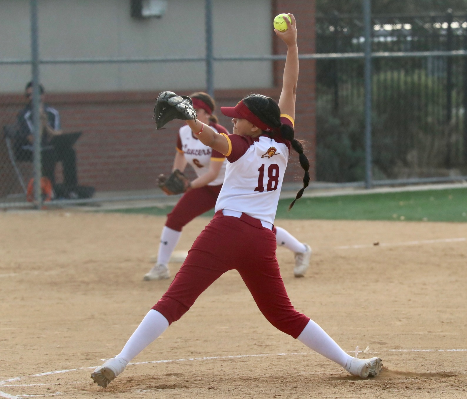 Elena Bahnimtewa delivers a pitch during her shutout over Compton on Thursday, photo by Michael Watkins.