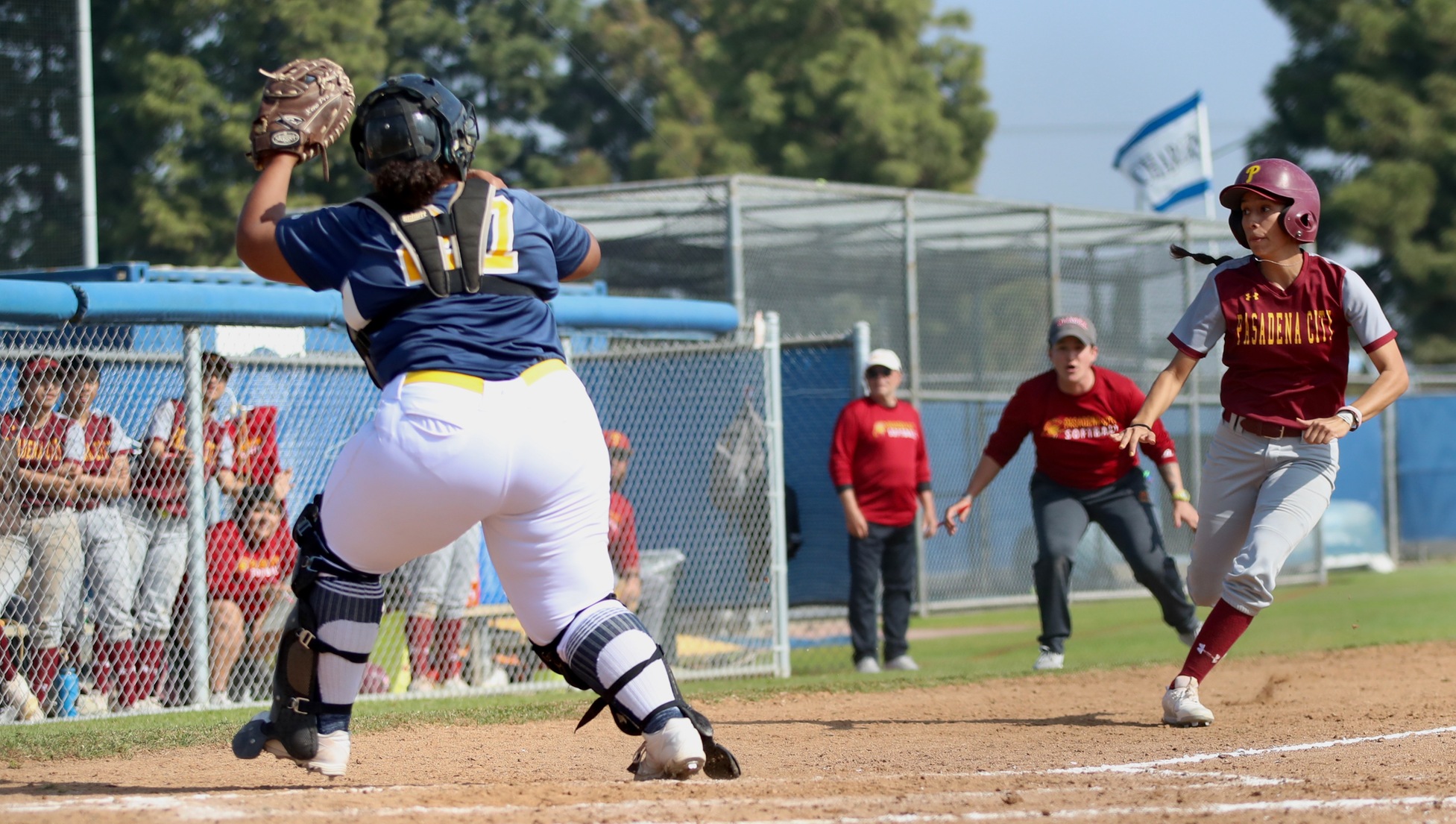Lancer runner Valley Febles scores on this play with head coach Monica Tantlinger looking on from third base coaches box during PCC's 7-6 win over SD Mesa at Cypress College on Saturday, photo by Michael Watkins.