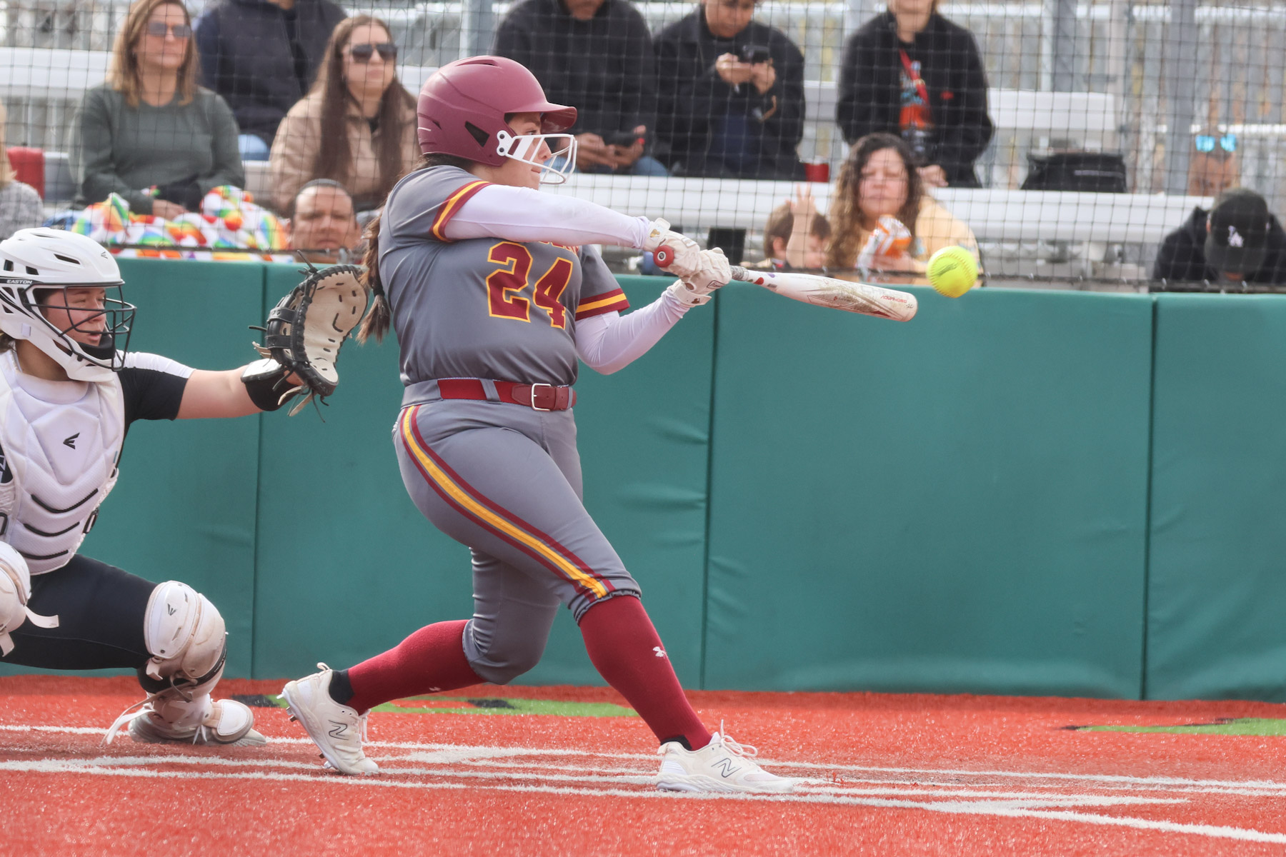 Adriana Valdez with hit here in the PCC softball team's season opener on Saturday (photo by Richard Quinton).