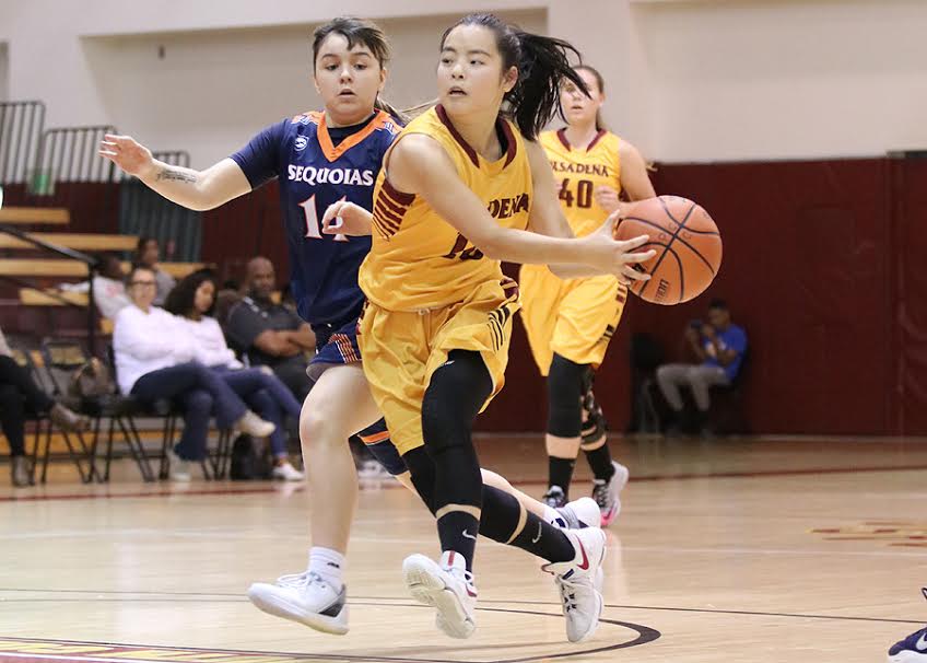 Lancer Jade Lin gets ready to fire a pass during PCC's championship final loss to College of the Sequoias at the 2nd President's Roundball Classic on Saturday, photo by Richard Quinton.