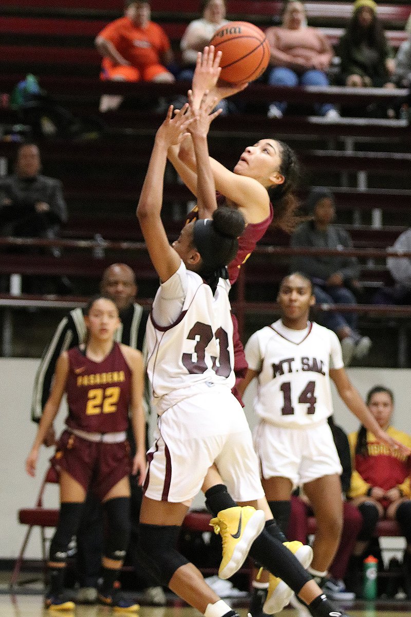 Daniela Mendez' late basket was PCC's final points in a 55-51 loss at Mt. San Antonio College Friday evening, photo by Richard Quinton.