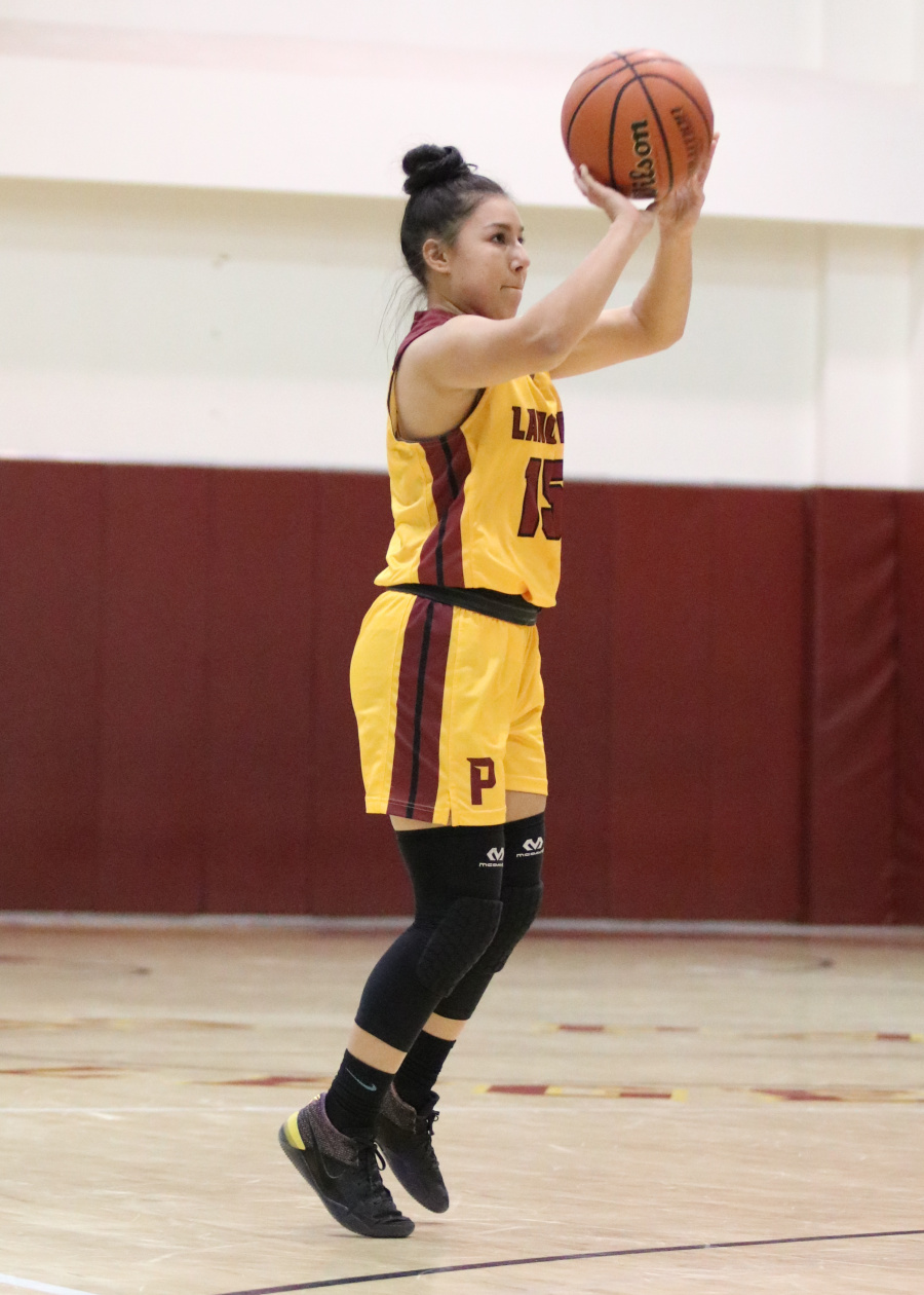 Lancer Melissa Felix fires up one of her five 3-point baskets in PCC's win over Chaffey Wednesday, photo by Richard Quinton.