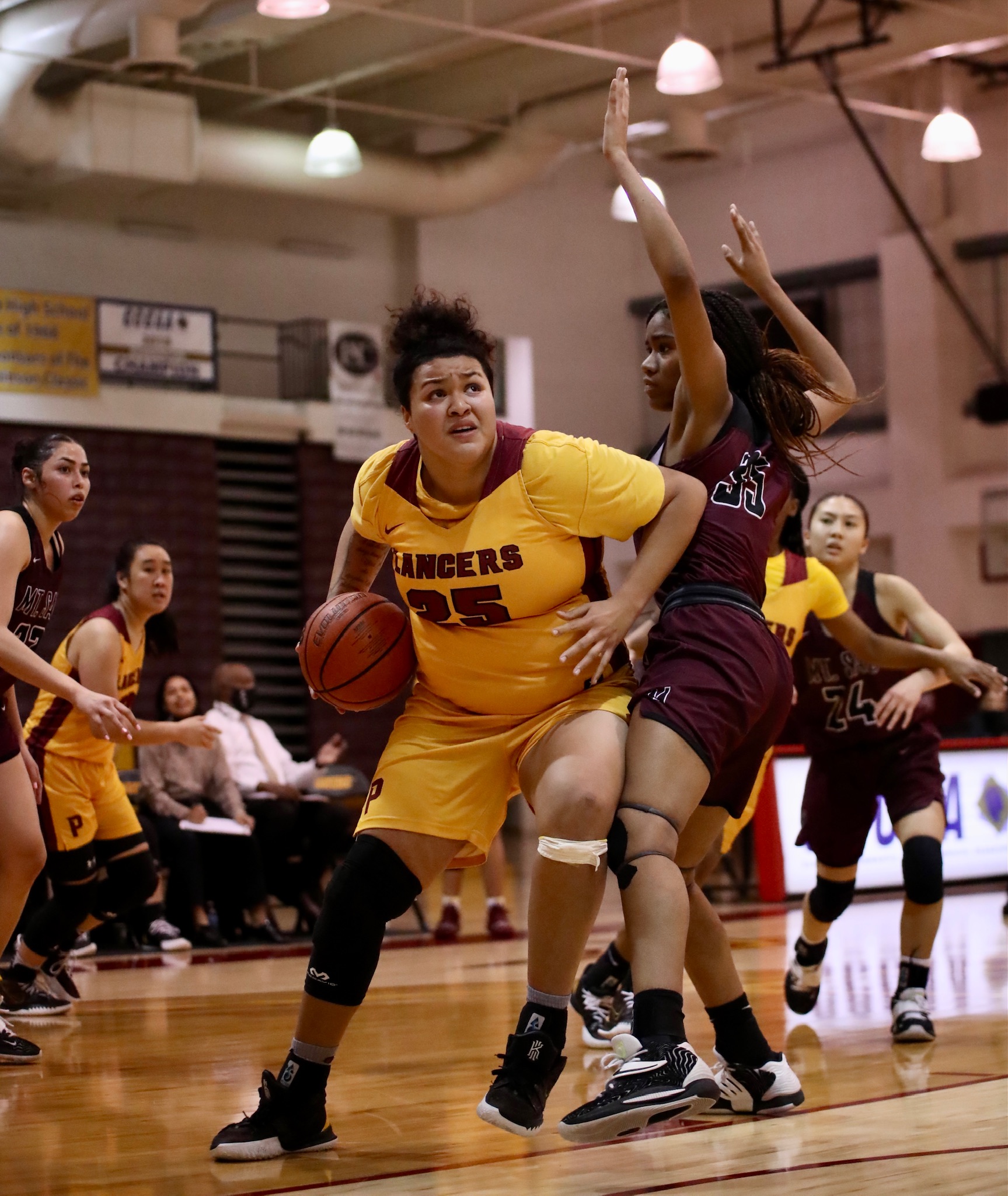 Tatiana Ayala goes to the hoop during PCC's game v. Mt. SAC on Friday night (Michael Watkins, Athletics).