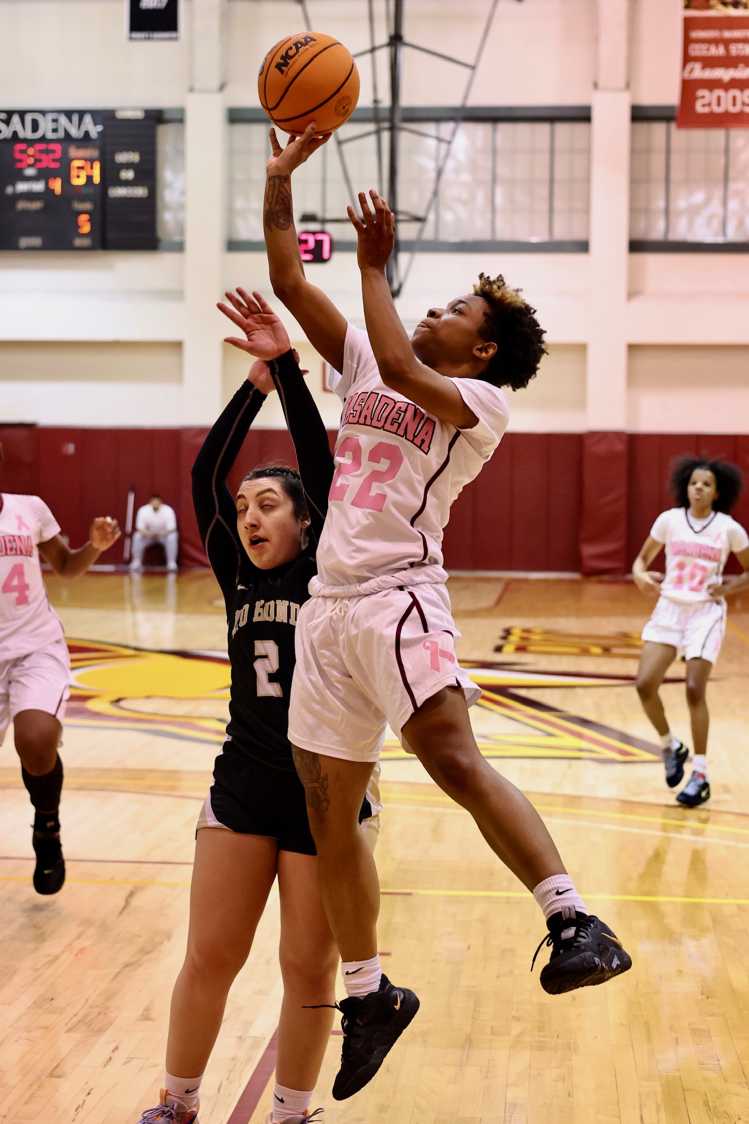 Bryannae Robinson goes up for a shot during Coaches v. Cancer Night game on Friday night (photo by Michael Watkins).
