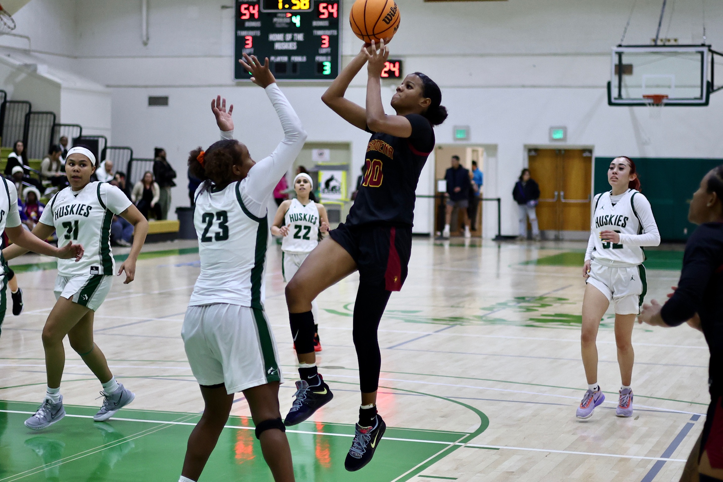 Sheridan Orange goes up for a shot during PCC's win at East Los Angeles College on Wednesday (photo by Michacel Watkins).