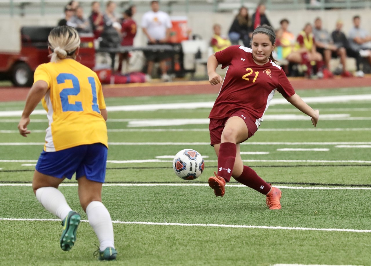 Montserrat Menendez fires a shot during PCC's rout on Wednesday at Robinson Stadium, photo by Michael Watkins.