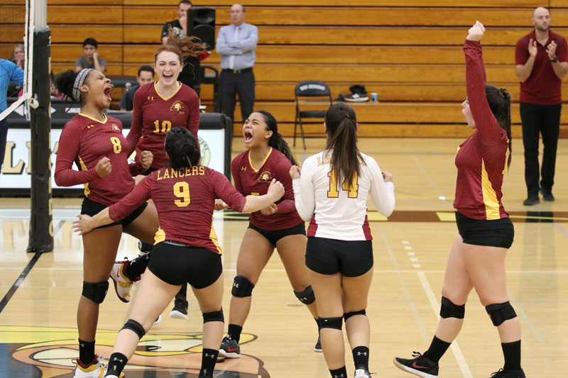 The Lancers celebrate a point late in their sweep at Rio Hondo College.