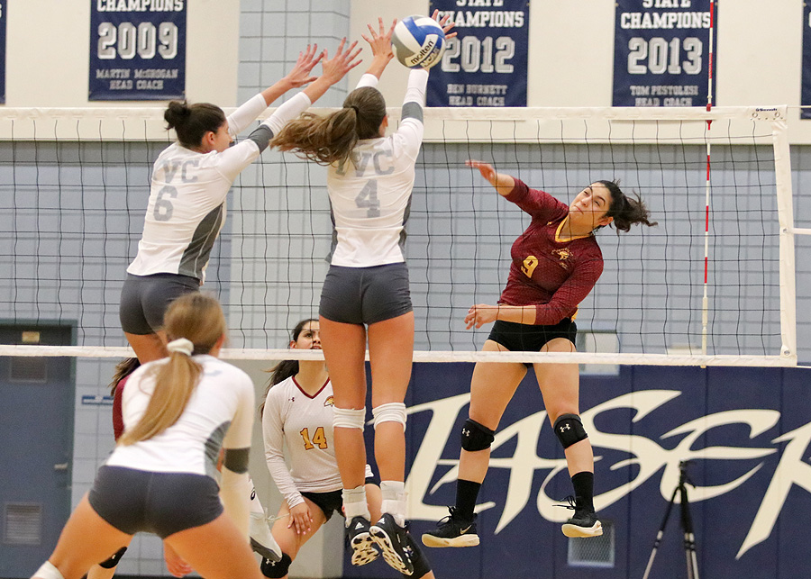 Lancer Leslie Rivera fires an attack during PCC's season-ending playoff loss at Irvine Valley College, photo by Richard Quinton.