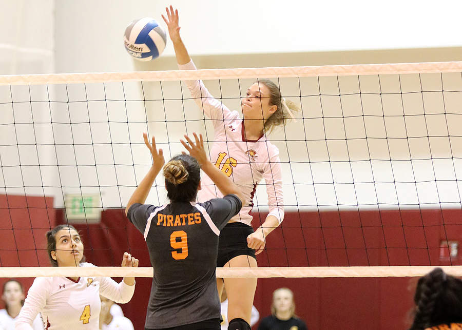 Rachel Johnson knocks down a kill during PCC's 5-set loss to Ventura at the H-P Gym on Wednesday evening, photo by Richard Quinton.