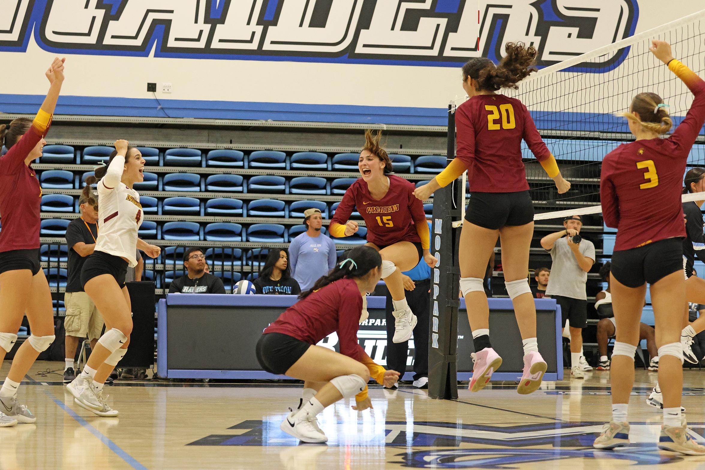 The PCC volleyball team lets its emotions out after match point in a thriller at Moorpark (photo by Richard Quinton).