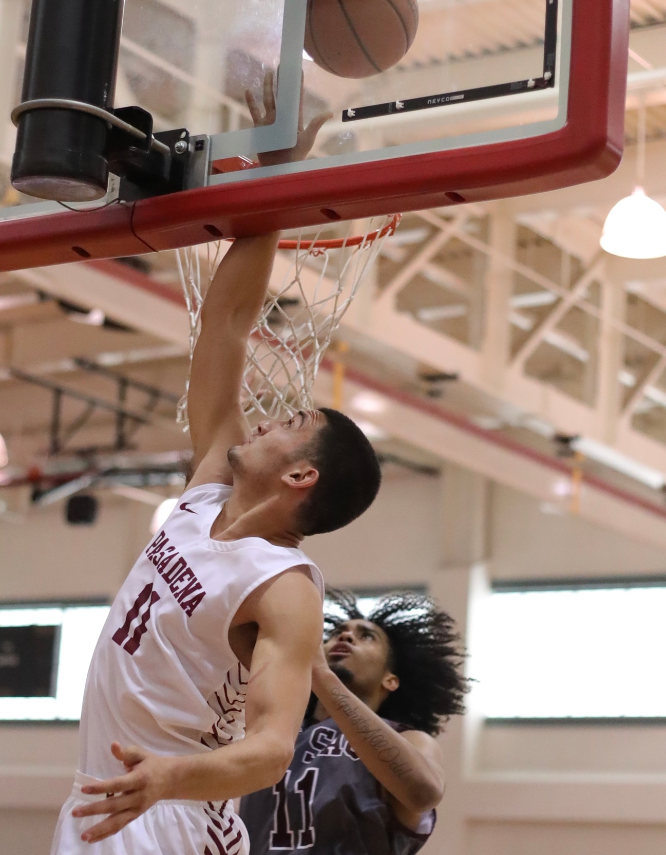 Gabriel Ajemian goes up for the ball during PCC's third-place final win v. Mt. SAC on Saturday at Hutto-Patterson Gymnasium, photo by Michael Watkins.