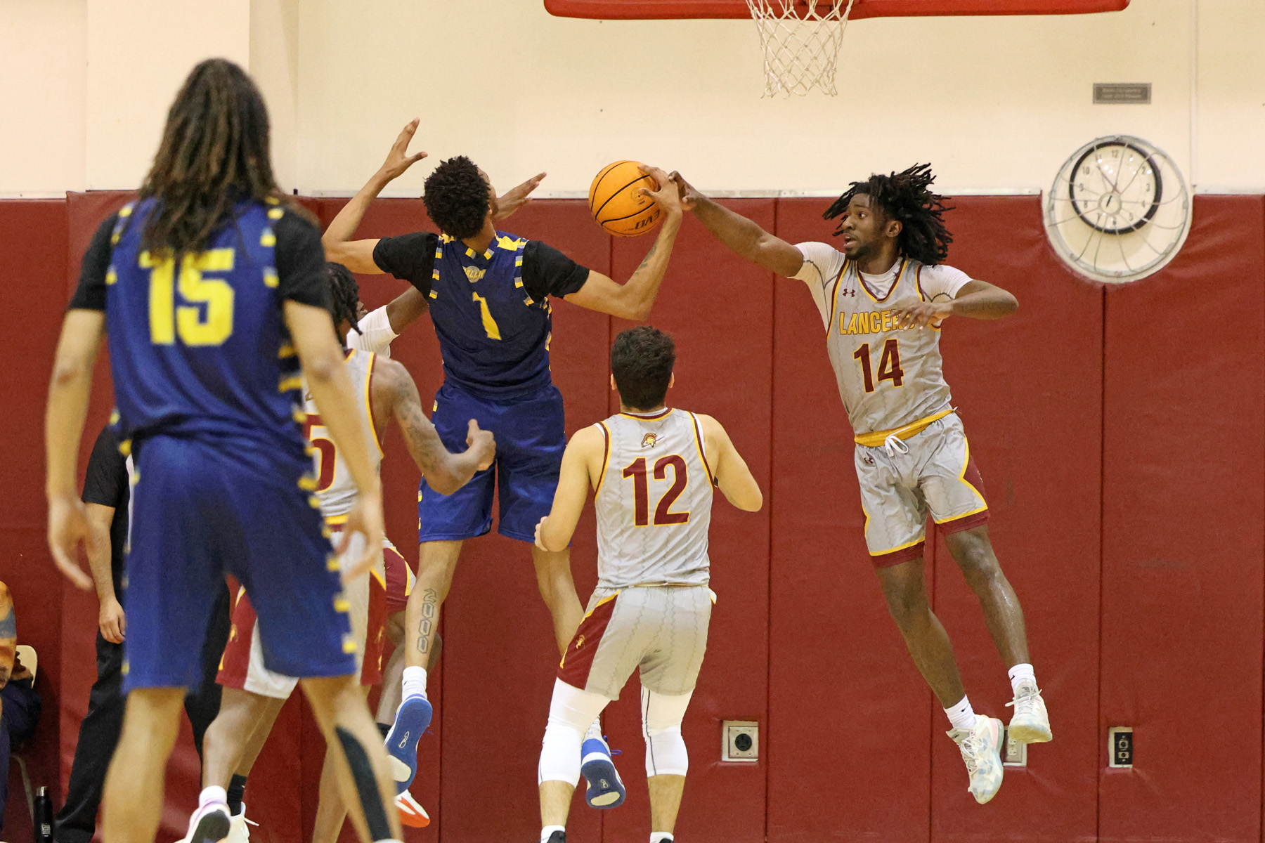 Deen Abdur-Rahmann makes the defensive play in PCC's playoff win on Wednesday (photo by Richard Quinton).