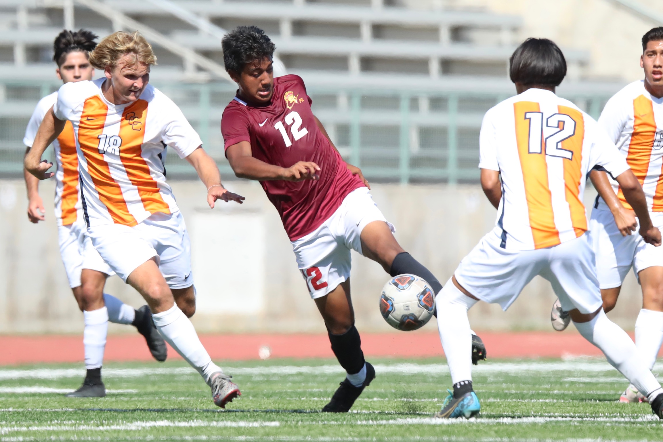 Elias Galaviz (12) plays a ball in a recent home game (photo by Michael Watkins).