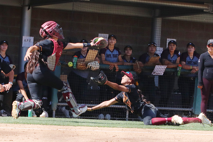 Lancers catcher Jennie Chacon makes the catch on a foul ball during PCC's game at Mt. San Antonio College on April 18, photo by Richard Quinton.